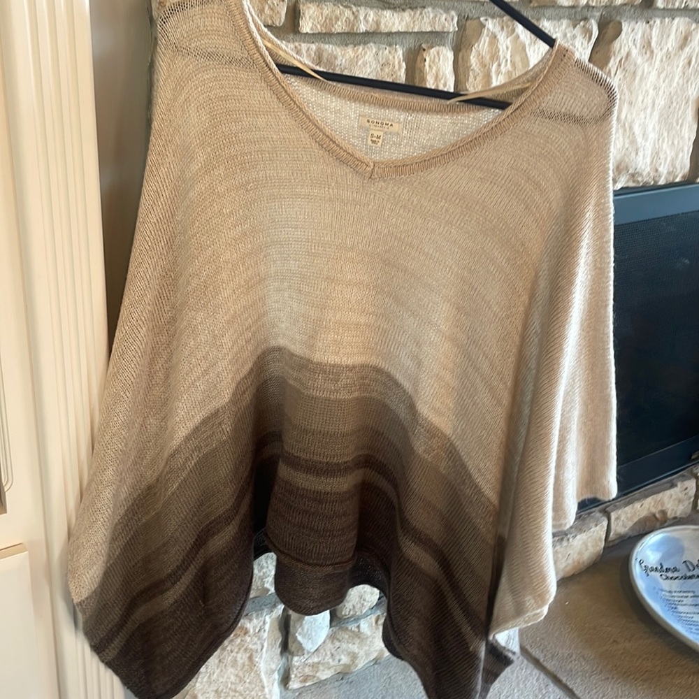 Sweater shrug. Size small-medium.